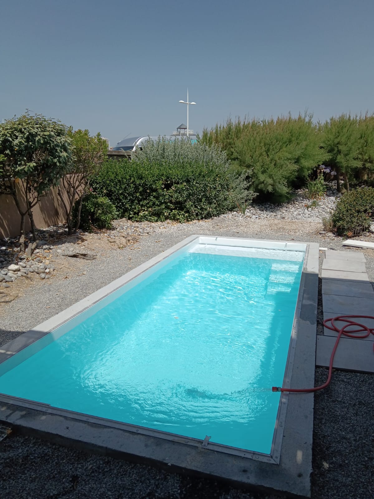 Piscine maçonnée eau turquoise membrane blanche Les Sables d'Olonne